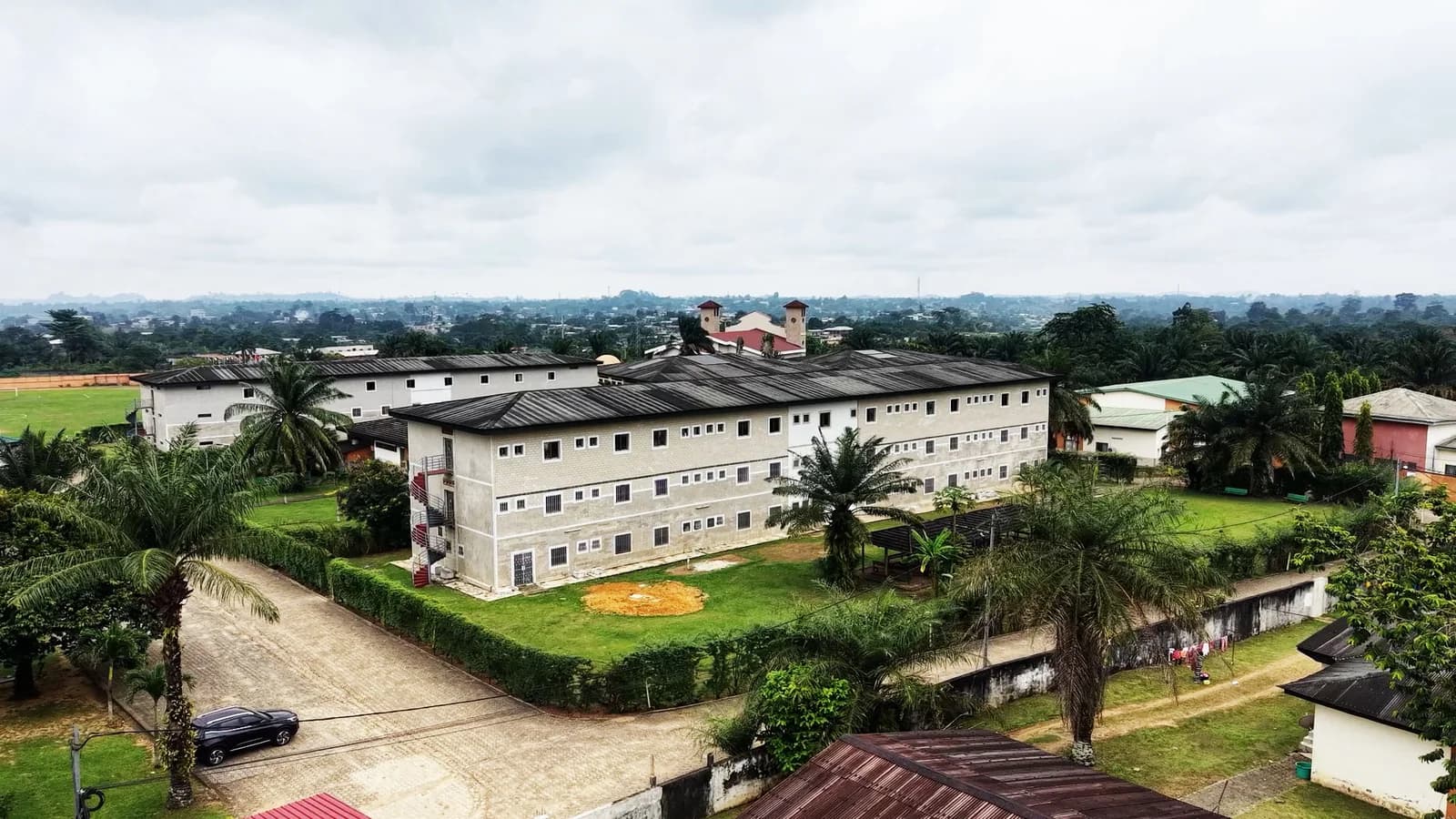 Aerial view of the main buildings and surroundings of the UIL-BJ campus